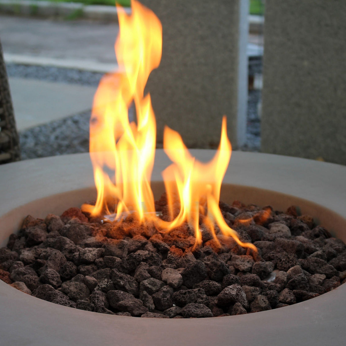 Elementi Lunar Bowl Fire Pit Table - Light Gray Lit and CLose Up showing Lava rocks