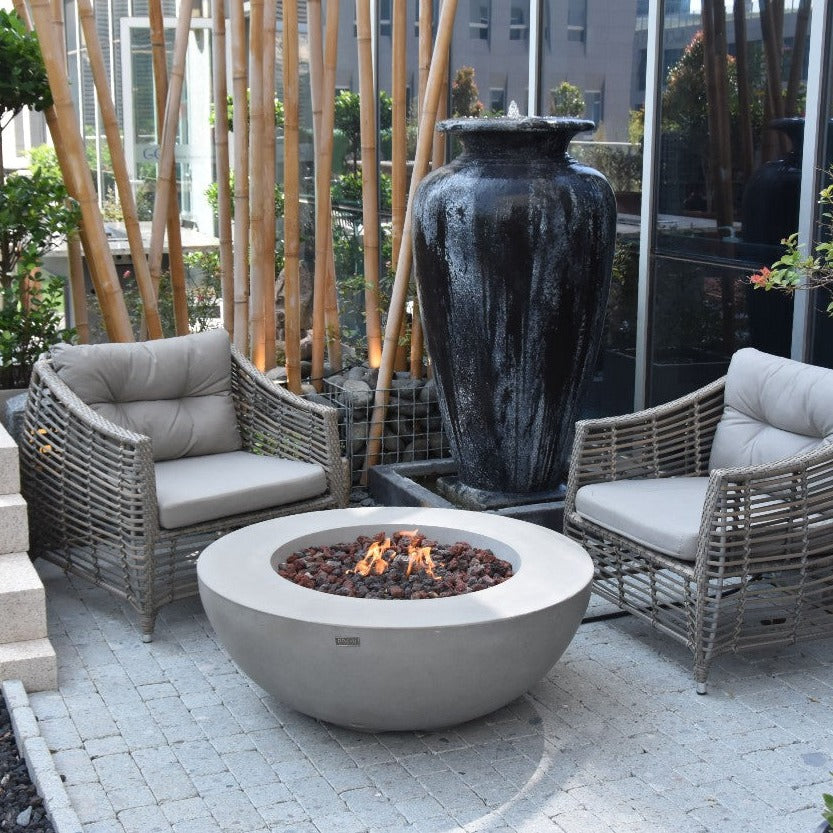 Elementi Lunar Bowl Fire Pit Table - Light Gray in a veranda with Gray furnitures